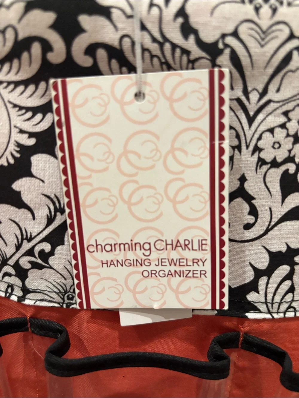 Charming Charlie 66-Pocket Hanging Organizer in Red and Black